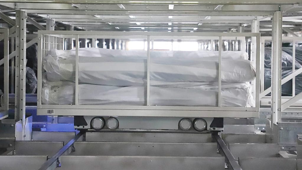 Six-Way Shuttle moving in a dense storage layout