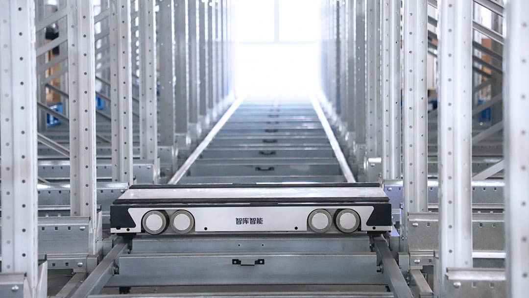 Four-Way Shuttle Operating in Dense Storage System Zikoo Robotics Four-way shuttle working in dense storage with automated storage retrieval system in an automatic 3D warehouse
