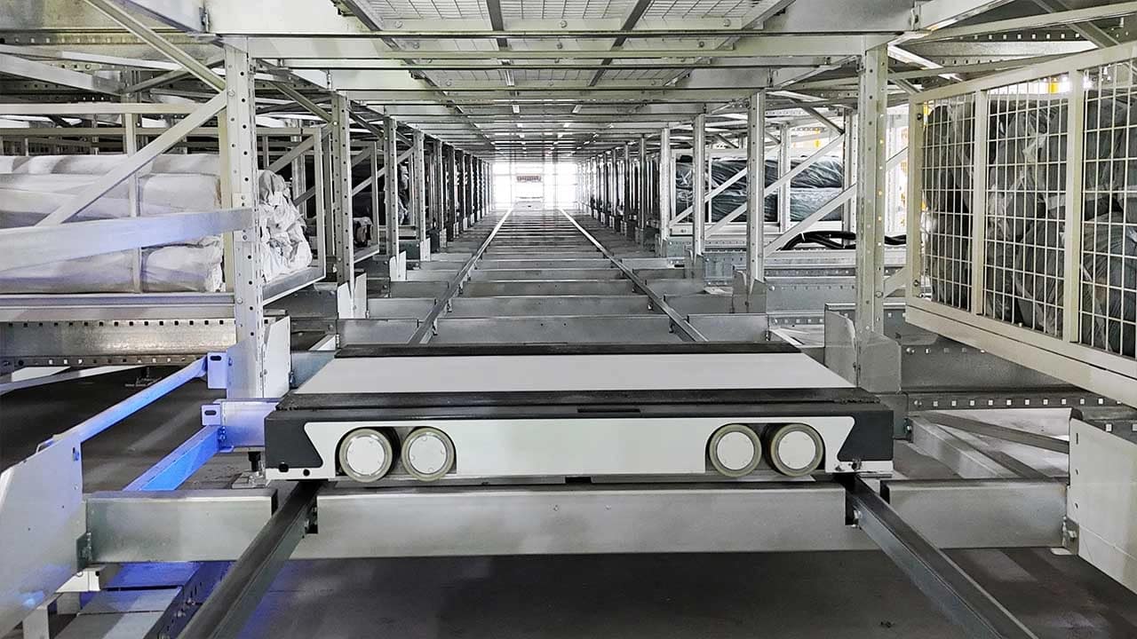 Zikoo Robotics Four-way shuttle working in dense storage with automated storage retrieval system in an automatic 3D warehouse