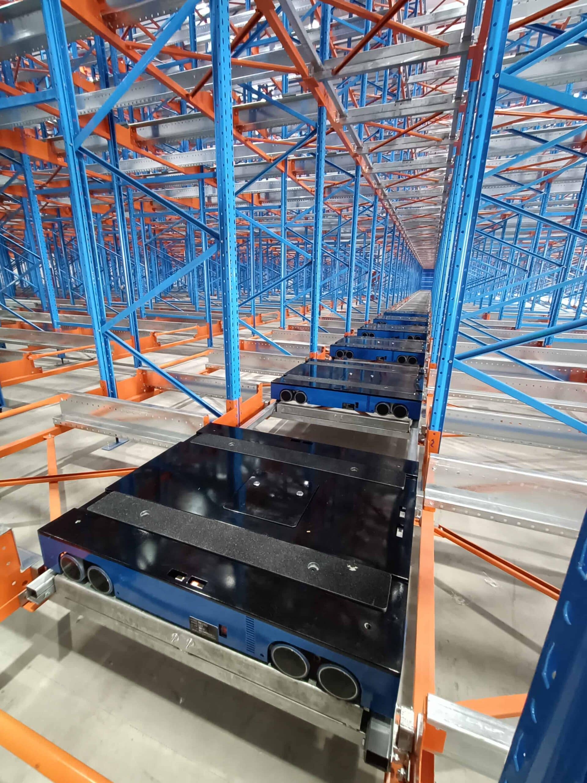 Zikoo Robotics R Bot Smart Four Way Pallet Shuttle Home Appliance Industry Shelf To Person5 Scaled