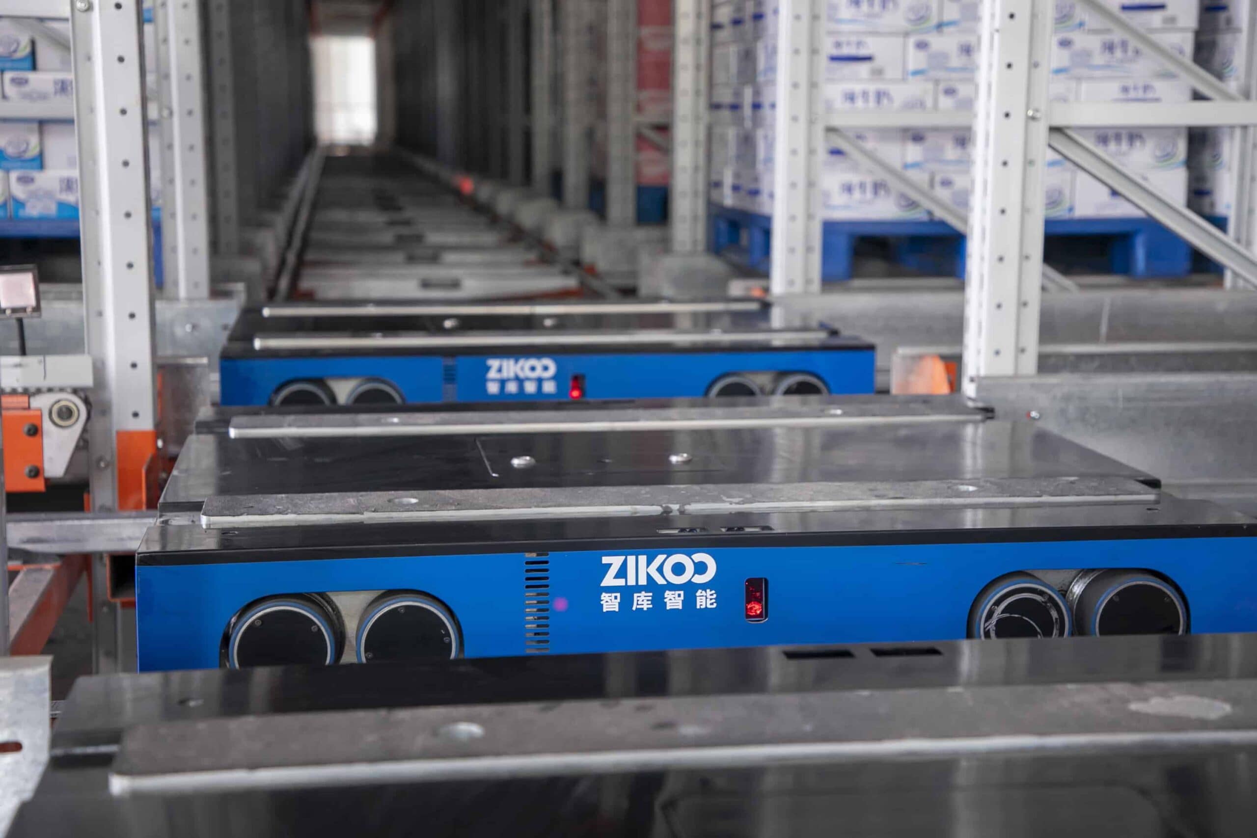 Zikoo Robotics R Bot Smart Four Way Pallet Shuttle Food And Dairy Enterprises Shelf To Person2 Scaled