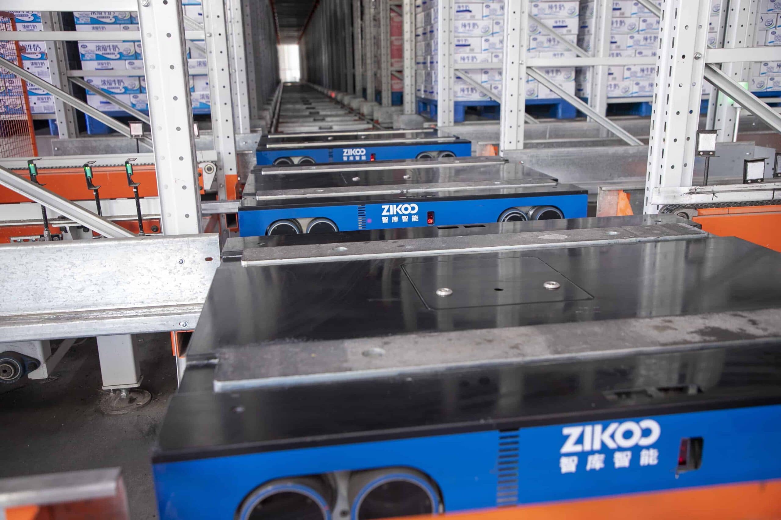 Zikoo Robotics R Bot Smart Four Way Pallet Shuttle Food And Dairy Enterprises Shelf To Person4 Scaled