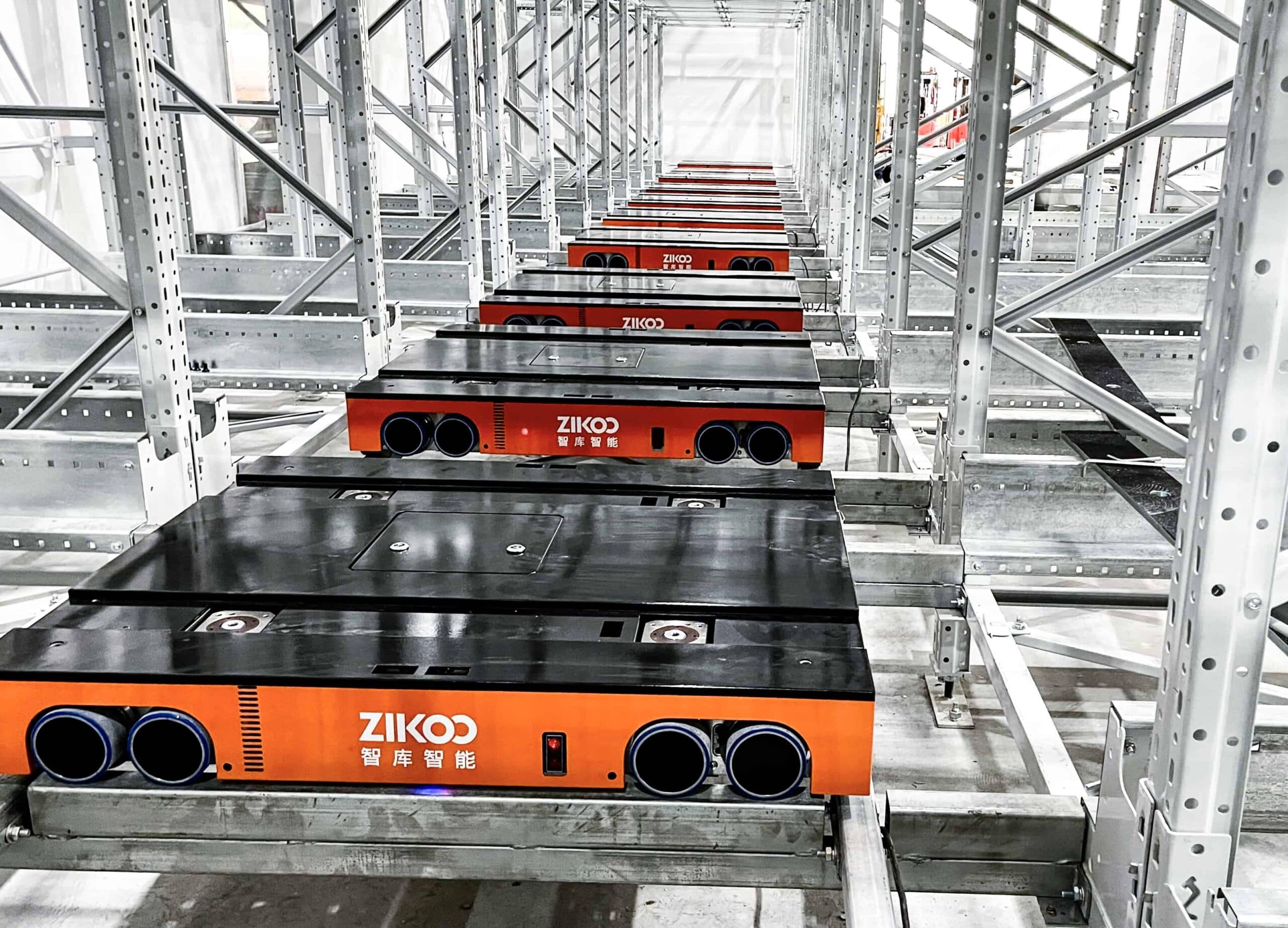 Zikoo Robotics R Bot Smart Four Way Pallet Shuttle Food Industry Dairy Giants Shelf To Person5 Scaled